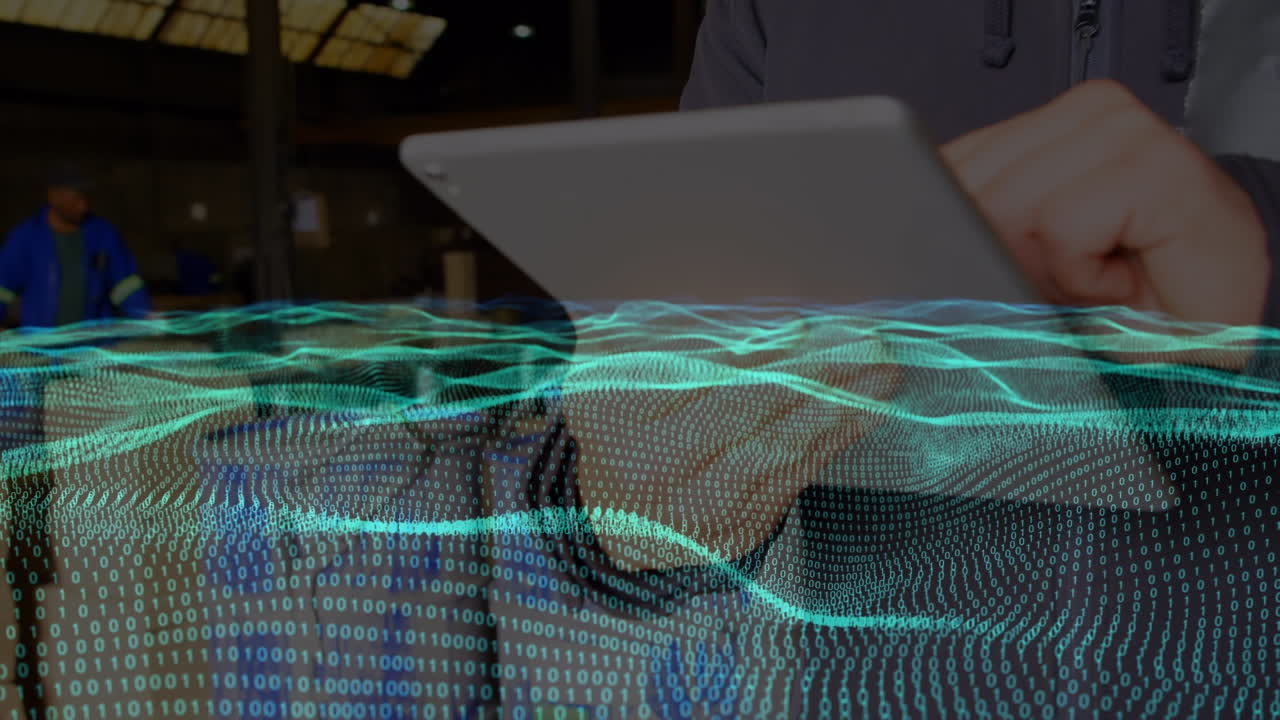 animación de ondas con procesamiento de datos sobre un trabajador caucásico usando una tableta
