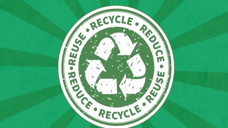 Animation of recycling symbol on green background