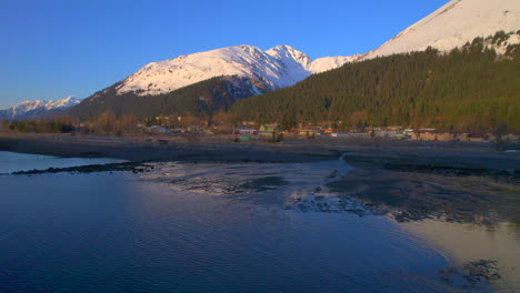 Sunrise-rising-up-aerial-view-of-Seward-Alaska-with-mountains