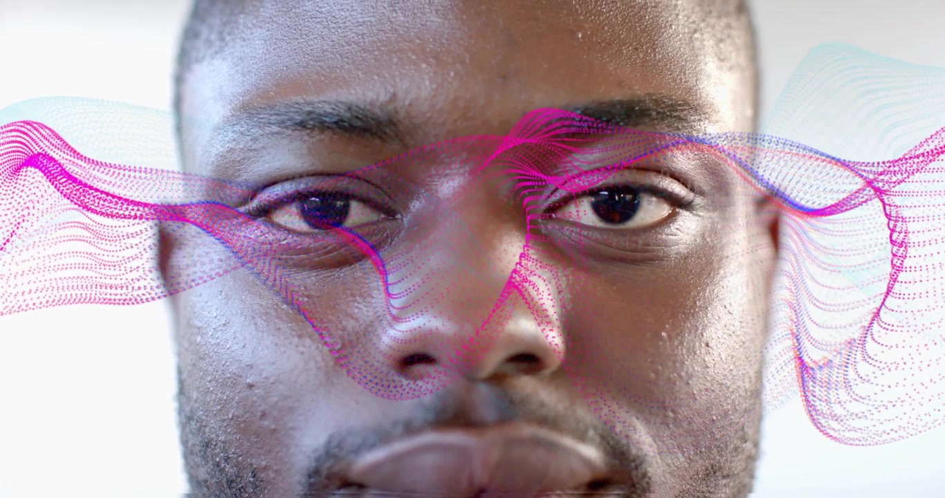 Man meditating, magenta wave sweeping across face causing eye opening then closing for tech display