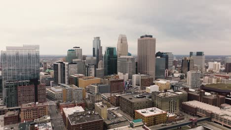 push in aerial drone shot of downtown minneapolis in minnesota