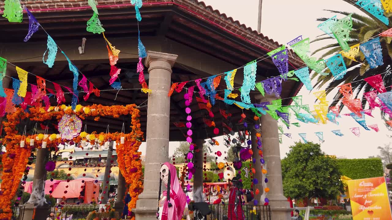 Panoramic shot of the main kiosk decorated with Day of the Dead motifs in the magical town of Tepotzotlán, Mexico