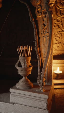 ornate wooden bow and arrow display