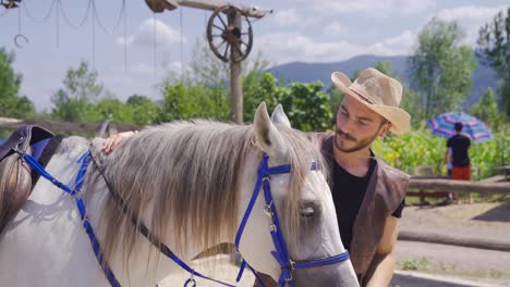 The-man-who-loves-the-mane-of-his-white-horse.