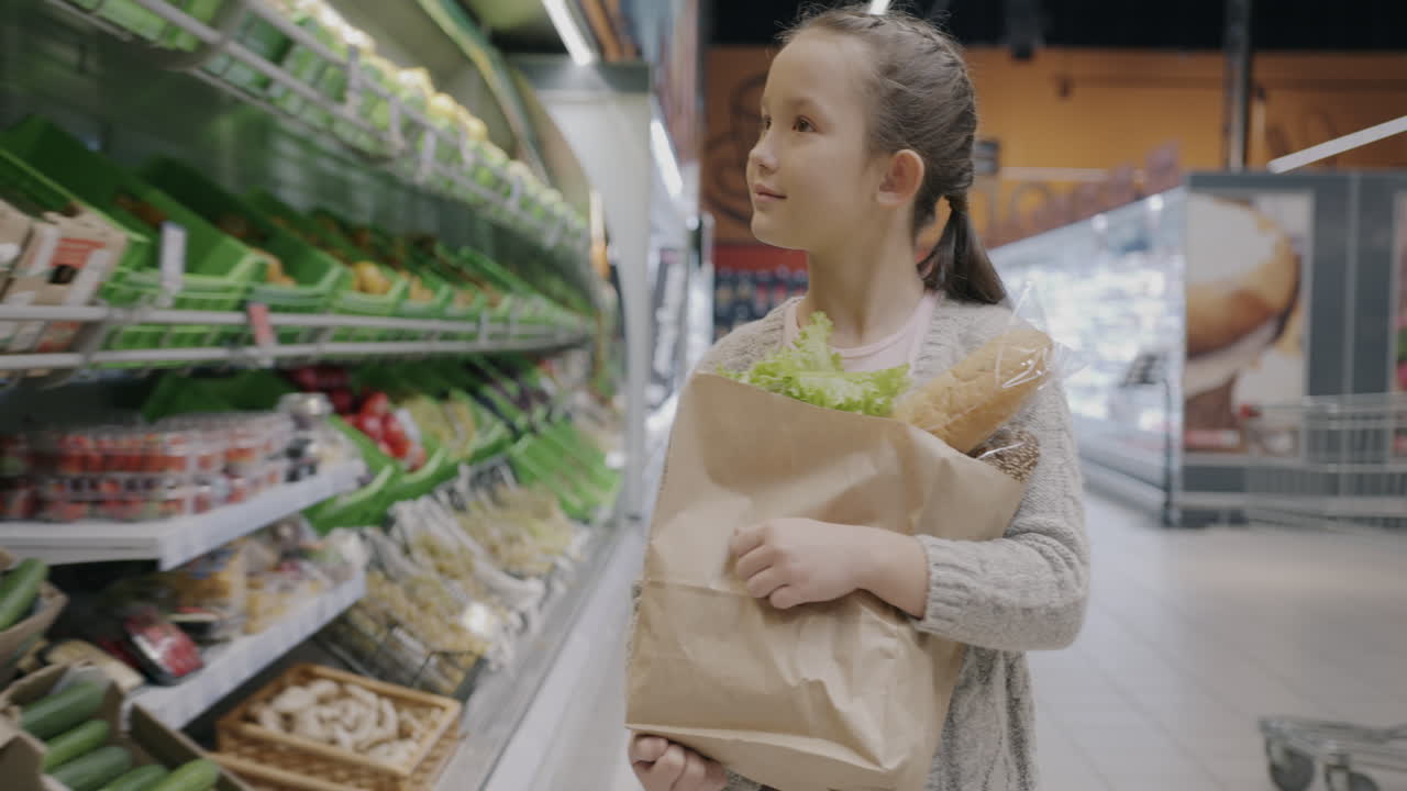 Girl Shopping for Groceries at Supermarket