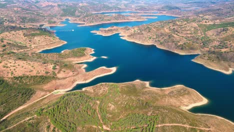 aerial view of blue dragon river, portugal, 4k