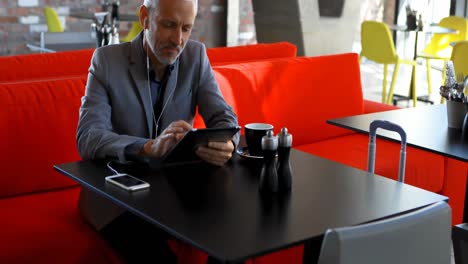 businessman using digital tablet in hotel 4k