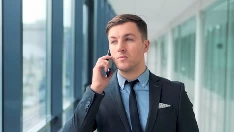 pretty businessman talking on the phone