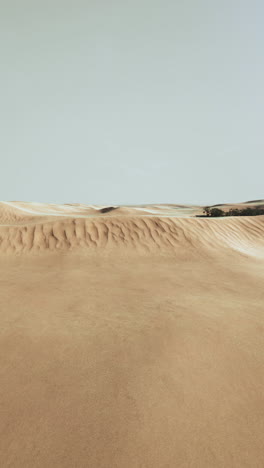 desert sand dunes under blue sky