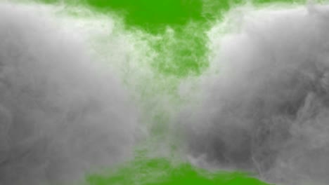 collision of two streams of smoke in front of a green screen.