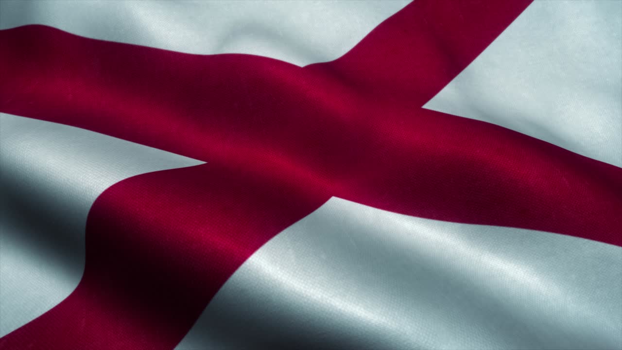 la bandera de alabama ondeando en el viento. la bandera nacional de alabama. el signo de alabama animación de bucle sin costuras. 4k