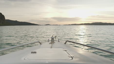 view out from the boat deck and see the sunset over the waters, langkawi