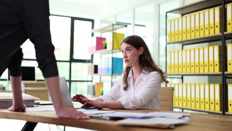 office scene with women working at desk