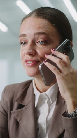 woman on phone in office