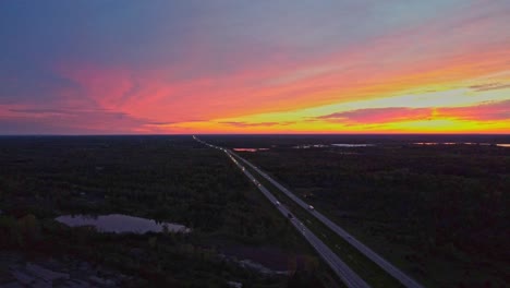 highway sunset red sky aerial  during fall season