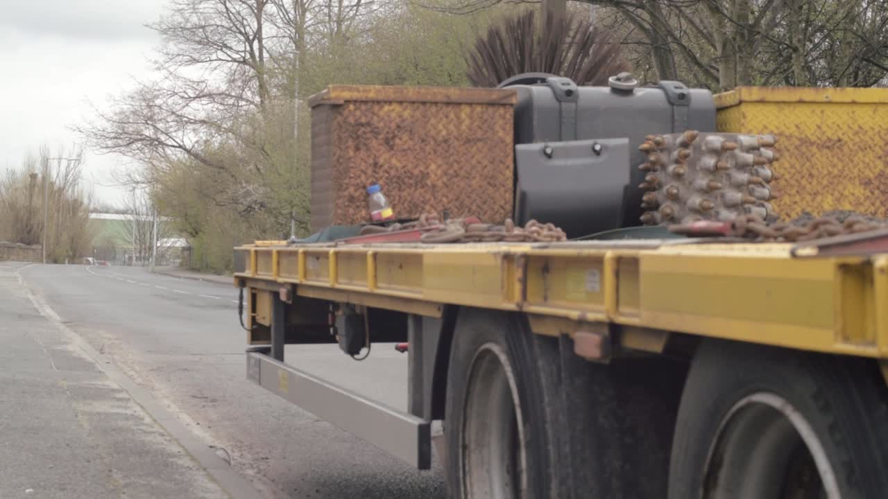 Heavy plant trailer parked on highway road