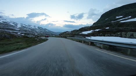 A-scenic-drive-through-the-Norwegian-countryside-following-another-vehicle