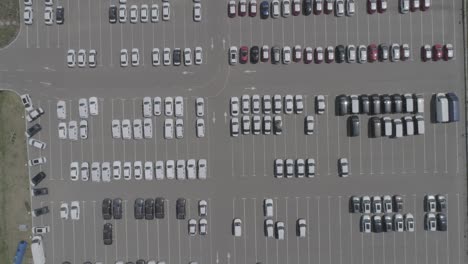 aerial view of new car storage parking lot. car park view from above.