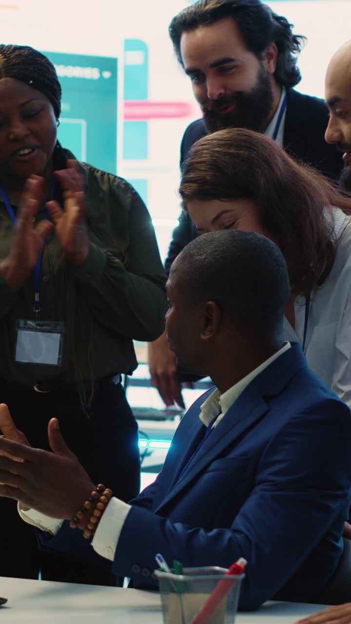 Diverse Business Team Celebrating Success and Clapping in Office