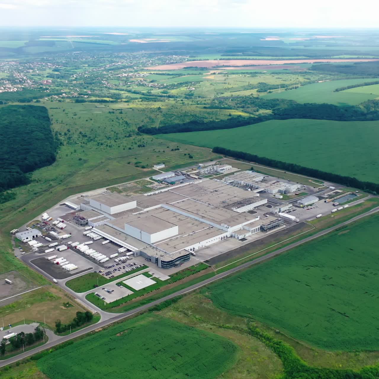 Large industrial zone from drone. Aerial view of large industrial zone with plants