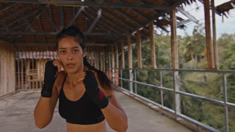 woman boxing training outdoors