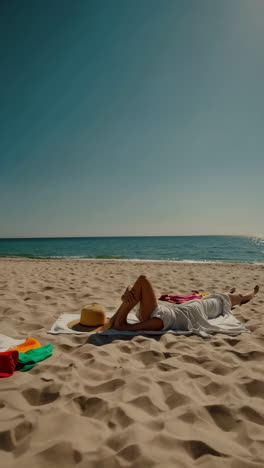 relaxing on a sandy beach by the ocean