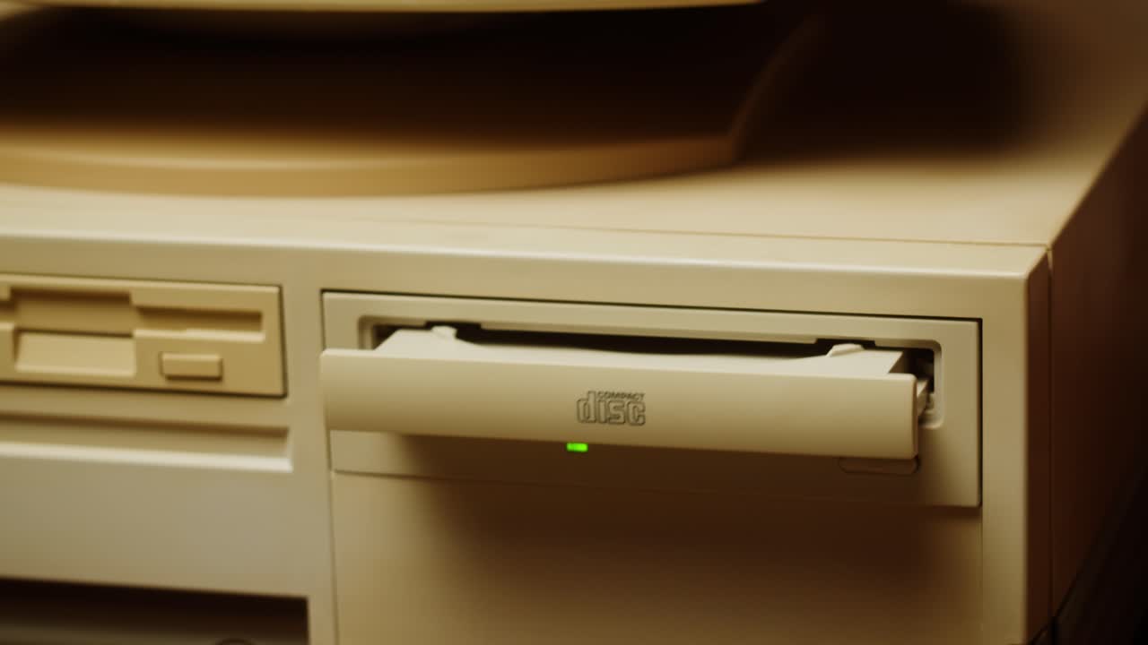 Inserting and Removing a CD from a Vintage Computer