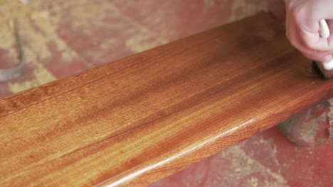 apply thinned coat of danish oil to sapele plank