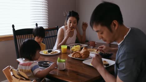 family enjoying time relaxing together at home