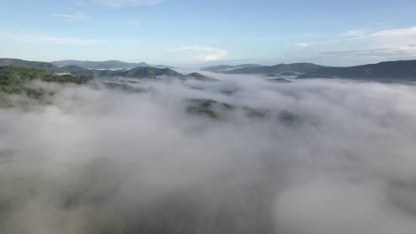 aerial drone flyover costa rica jungle and mountain with cloud fog, 4k