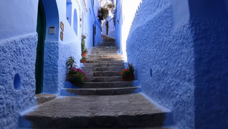 Vibrant Blue Alleyway with Stairs in Chefchaouen, Morocco