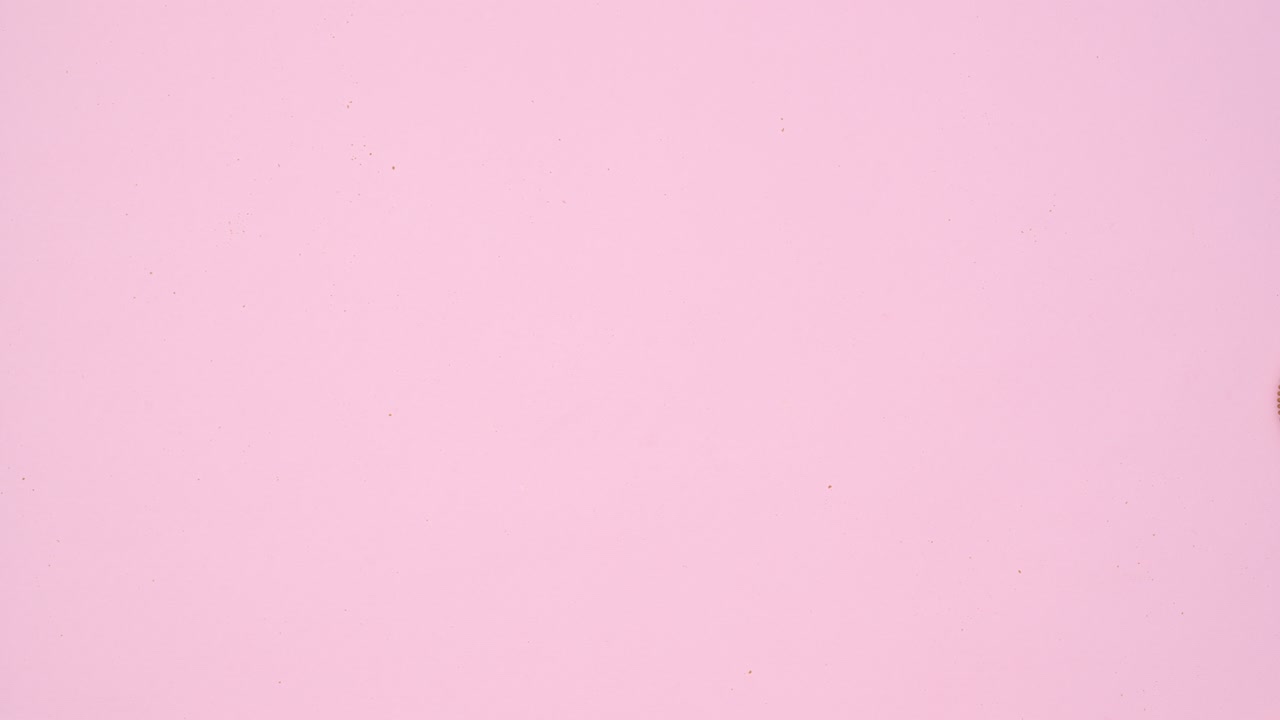 Three columns of round cookies appear and move on pastel pink theme. Stop motion