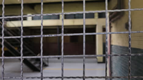 Looking-Though-Wire-Inside-Old-Korean-Prison-at-Iksan-Film-Set