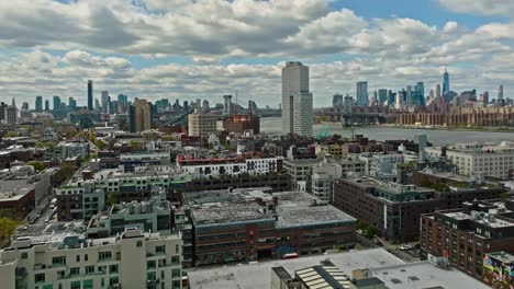 aerial view of luxury residential areas of greenwich district and skyline of new york city in background