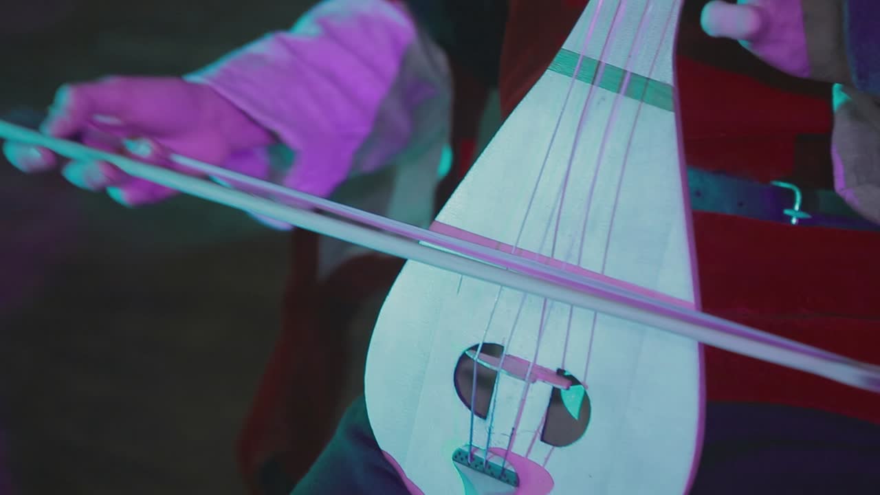 Man Playing Old Vintage Lute. Man playing old vintage lute string instrument