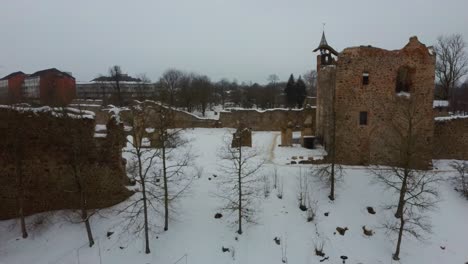 Ruins-of-Ancient-Livonian-Order's-Stone-Medieval-Castle-Latvia-Aerial-Drone-Top-Shot-From-Above