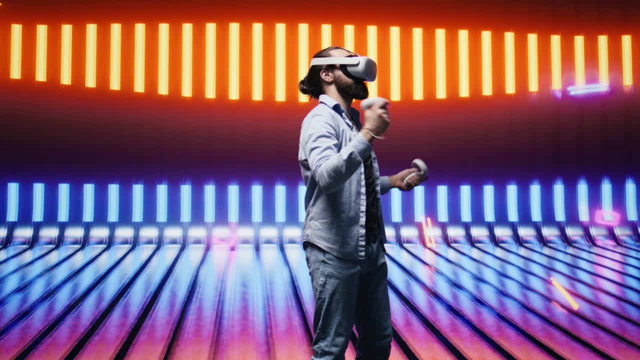 Artsy young guy immersed in virtual reality under neon lights and cyberpunk glow