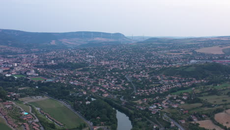 Millau-city-aerial-view-river-Tarn-and-viaduct-Millau-suspension-bridge-France