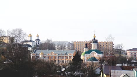 cityscape with churches in winter