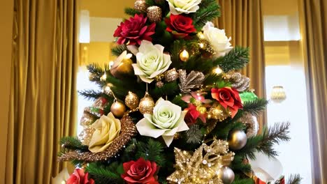 christmas tree decorated with paper flowers