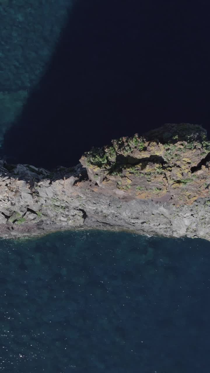 Aerial View of Rocky Coastline and Ocean