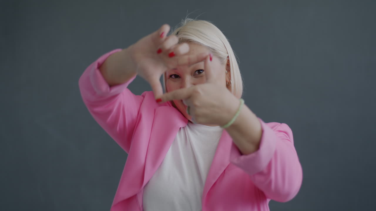 Woman in Pink Blazer Posing