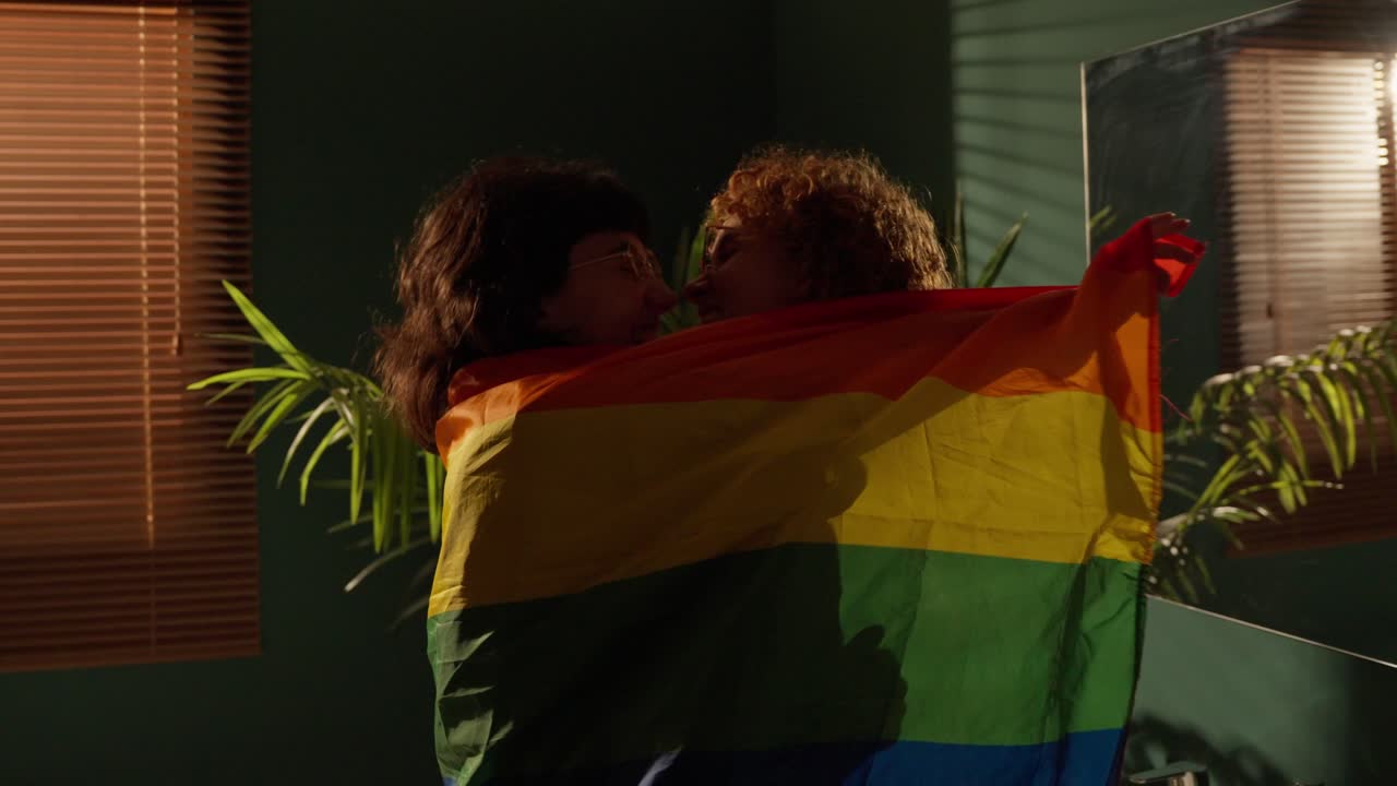 Lesbian Couple with Pride Flag