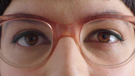 closeup portrait of a woman wearing glasses