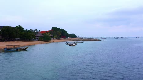 boats at the coastal town in sanur near mertasari beach in bali, indonesia