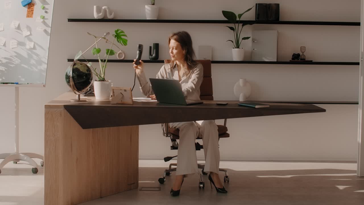 Woman Working in a Modern Home Office