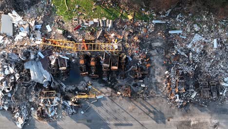 top down aerial shot of rubble and debris after building fire and explosion