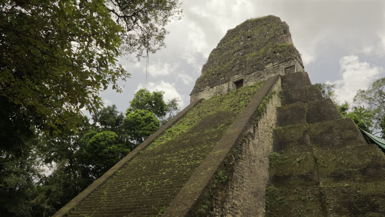 Tikal Pyramid temple 5 in Petén, Guatemala. Ancient mayan architecture ruins.