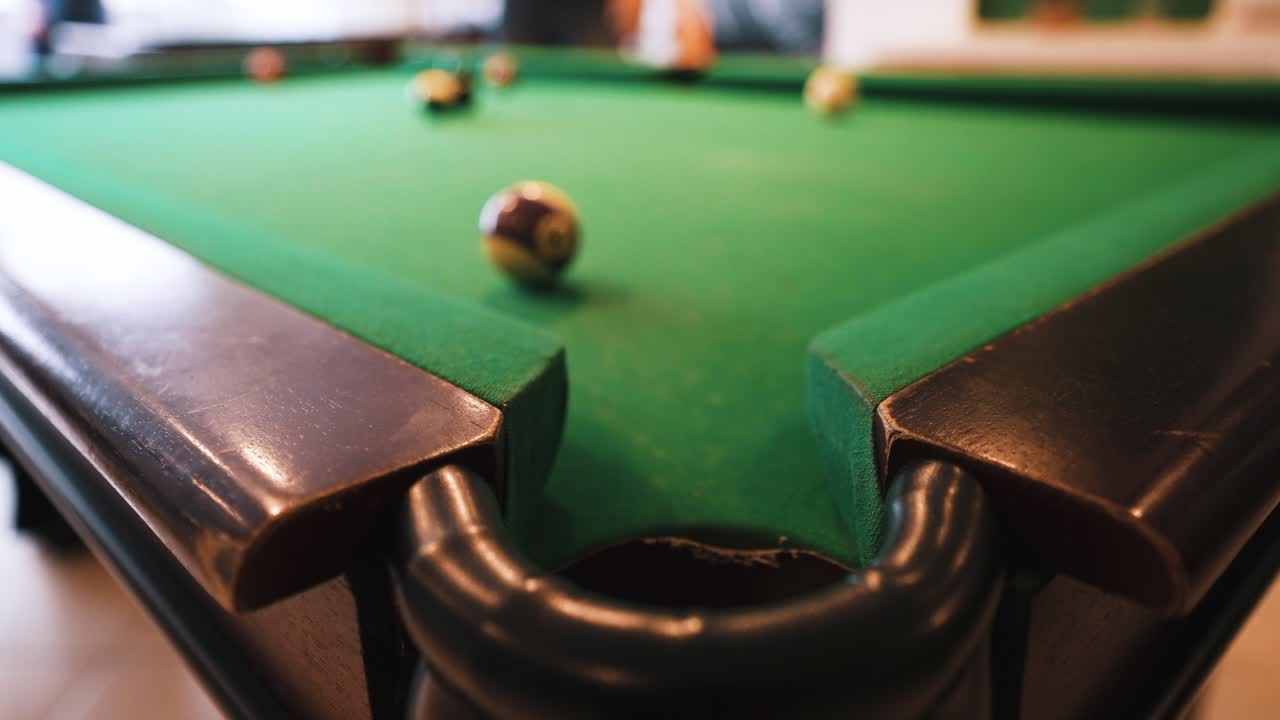 Missing the shot on snooker billiard table pocket on focus