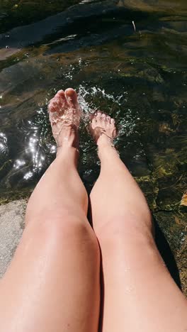 relaxing feet in a stream